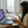 Học sinh học trực tuyến tại nhà. (Ảnh minh họa. Nguyễn Cúc/TTXVN)