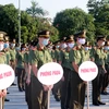 Cán bộ, chiến sỹ Công an Nam Định tham dự lễ ra quân đảm bảo an ninh trật tự cho Ngày Bầu cử đại biểu Quốc hội khoá XV và đại biểu Hội đồng Nhân dân các cấp, nhiệm kỳ 2021-2026. (Ảnh: Văn Đạt/TTXVN) 