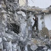 Cảnh đổ nát sau các vụ không kích của Israel tại Gaza ngày 15/6/2021. (Ảnh: AFP/TTXVN)