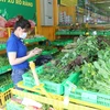 Phong phú mặt hàng rau xanh tại Cửa hàng Điện máy xanh thành phố Cao Lãnh trong ngày đầu giãn cách xã hội ở Đồng Tháp. (Ảnh : Nguyễn Văn Trí/TTXVN)