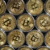 Đồng tiền kỹ thuật số bitcoin. (Ảnh: AFP/TTXVN) 