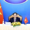 Bộ trưởng Bộ Ngoại giao Bùi Thanh Sơn dự Hội nghị Hợp tác Mekong-Nhật Bản lần thứ 14 theo hình thức trực tuyến. (Ảnh: Phạm Kiên/TTXVN) 