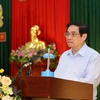 Thủ tướng Phạm Minh Chính chúc mừng và giao nhiệm vụ cho Viện Khoa học hình sự. (Ảnh: Dương Giang/TTXVN)