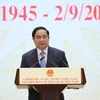 Thủ tướng Phạm Minh Chính đọc diễn văn tại lễ kỷ niệm. (Ảnh: Dương Giang/TTXVN) 