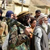 Các tay súng thuộc lực lượng kháng chiến chống Taliban ở tỉnh Panjshir, Afghanistan, ngày 31/8/2021. (Ảnh: AFP/TTXVN) 