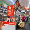 Một siêu thị đã mở cửa phục vụ khách hàng ở ngõ 24 đường Kim Đồng, sáng 13/9. (Ảnh: Hoàng Hiếu/TTXVN) 