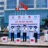 Lễ xuất quân tiễn các cán bộ, sinh viên Đại học Y Dược Cần Thơ chi viện hỗ trợ tỉnh Kiên Giang chống dịch. (Ảnh: TTXVN phát)