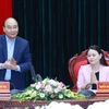 Chủ tịch nước Nguyễn Xuân Phúc tại buổi làm việc với Ban Chấp hành Đảng bộ tỉnh Ninh Bình. (Ảnh: Thống Nhất/TTXVN)