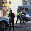 Cảnh sát bắt giữ một kẻ tình nghi khủng bố tại Valencia, Tây Ban Nha. Ảnh tư liệu. (Ảnh: AFP/TTXVN)