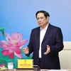 Thủ tướng Phạm Minh Chính phát biểu tại buổi gặp mặt. (Ảnh: Dương Giang/TTXVN)
