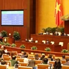 Quốc hội biểu quyết thông qua Nghị quyết về dự toán ngân sách nhà nước năm 2022 với 93,19% số phiếu tán thành. (Ảnh: Trọng Đức/TTXVN)