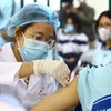 Trên 1.720 học sinh trường Trung học phổ thông Ngô Quyền thành phố Hải Phòng được tiêm vaccine phòng, chống COVID-19. (Ảnh: An Đăng/ TTXVN) 