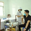Tiêm vaccine phòng COVID-19 cho người dân tại Thái Nguyên. (Ảnh: Trần Trang/TTXVN) 