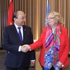 Chủ tịch nước Nguyễn Xuân Phúc gặp bà Tatiana Valovaya, Tổng giám đốc Văn phòng Liên hợp quốc tại Geneve. (Ảnh: Thống Nhất/TTXVN)