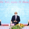 Chủ tịch nước Nguyễn Xuân Phúc chủ trì hội thảo về nhà nước pháp quyền xã hội chủ nghĩa. (Ảnh: Thống Nhất/TTXVN) 