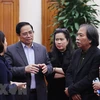 Thủ tướng Phạm Minh Chính với các đại biểu Liên hiệp các Hội Văn học Nghệ thuật Việt Nam. (Ảnh: Dương Giang/TTXVN) 