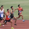 Các vận động viên thi đấu nội dung chạy 100m nam. (Ảnh: Hoàng Hiếu/TTXVN)