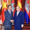Thủ tướng Nguyễn Xuân Phúc tiếp Thủ tướng Campuchia Samdech Techo Hun Sen nhân dịp sang Việt Nam dự Hội nghị Diễn đàn Kinh tế thế giới (WEF) về ASEAN 2018. (Ảnh: Thống Nhất/TTXVN)