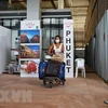 Du khách quốc tế tới sân bay quốc tế Phuket, Thái Lan. (Ảnh: AFP/TTXVN) 