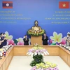 Thủ tướng Phạm Minh Chính và Thủ tướng Lào Phankham Viphavanh đồng chủ trì kỳ họp. (Ảnh: Dương Giang/TTXVN) 