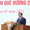 Thủ tướng Phạm Minh Chính phát biểu tại buổi gặp mặt kiều bào dự Xuân quê hương năm 2022. (Ảnh: Dương Giang/TTXVN)