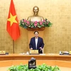Thủ tướng Phạm Minh Chính phát biểu khai mạc Phiên họp Chính phủ tháng 1/2022. (Ảnh: Dương Giang/TTXVN) 