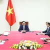 Thủ tướng Phạm Minh Chính điện đàm với ông Kasper Rorsted, Giám đốc điều hành Adidas. (Ảnh: Dương Giang/TTXVN)