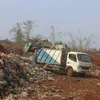 Khối lượng lớn rác thải tồn đọng tại bãi thu gom rác thải của huyện Đắk R’lấp (Đắk Nông). (Ảnh: TTXVN phát)