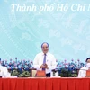 Chủ tịch nước Nguyễn Xuân Phúc chủ trì Hội thảo quốc gia lần thứ 3 về xây dựng và hoàn thiện Nhà nước pháp quyền xã hội chủ nghĩa. (Ảnh: Thống Nhất/TTXVN) 