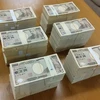 Đồng tiền giấy mệnh giá 10.000 yen Nhật Bản. (Ảnh: AFP/TTXVN)