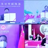 Trưởng Ban Đối ngoại Trung ương Lê Hoài Trung và Trưởng Ban Liên lạc Đối ngoại Trung ương Trung Quốc Tống Đào ký kết trực tuyến kế hoạch hợp tác giữa hai Đảng. (Ảnh: Phương Hoa/TTXVN)