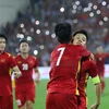 Các cầu thủ U23 Việt Nam ăn mừng bàn thắng mở tỷ số ở phút 70 của tiền vệ đội trưởng Hùng Dũng. Ảnh: Hoàng Linh-TTXVN 