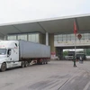 Xe hàng xuất khẩu của việt Nam qua cửa khẩu Lào Cai. (Ảnh: Hồng Ninh/TTXVN)