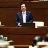 Bộ trưởng Bộ Nông nghiệp và Phát triển nông thôn Lê Minh Hoan trả lời chất vấn của các đại biểu Quốc hội. (Ảnh: Lâm Khánh/TTXVN)