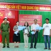 Quang cảnh buổi công khai xin lỗi người bị khởi tố, tạm giam oan tại Bình Thuận. (Ảnh: Nguyễn Thanh/TTXVN)