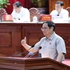 Thủ tướng Phạm Minh Chính phát biểu tại buổi tiếp xúc cử tri thành phố Cần Thơ. (Ảnh: Dương Giang/TTXVN)