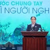 Thủ tướng Phạm Minh Chính phát biểu, vận động ủng hộ giúp đỡ người nghèo nhân Tháng cao điểm Vì người nghèo năm 2022. (Ảnh: Dương Giang/TTXVN)