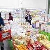 Người dân mua sắm tại siêu thị Hapro Khâm Thiên, Hà Nội. (Ảnh: Trần Việt/TTXVN) 