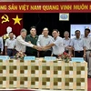 Sở Nông nghiệp và Phát triển nông thôn An Giang và Tập đoàn Lộc Trời ký kết thỏa thuận hợp tác xây dựng chuỗi liên kết sản xuất, tiêu lúa, nếp trên địa bàn An Giang. (Ảnh: Thanh Sang/TTXVN)