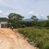 Lô đất có diện tích 1.644m2 của hộ bà Nguyễn Thị Tiến (xã Hòa Phú, huyện Hòa Vang) bị chính quyền huyện Hòa Vang “cấp nhầm” cho nhà hàng xóm, đến khi bị giải tỏa phục vụ dự án giao thông thì gia đình mới phát hiện ra. (Ảnh: Quốc Dũng/TTXVN)