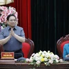 Thủ tướng Phạm Minh Chính chủ trì buổi làm việc với lãnh đạo chủ chốt tỉnh Ninh Bình. (Ảnh: Dương Giang/TTXVN)