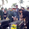 Truy điệu, an táng 2 hai cốt liệt sỹ tại Nghĩa trang liệt sỹ huyện Tuy Đức. (Ảnh: Ngọc Minh/TTXVN)