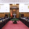 Thủ tướng Phạm Minh chính chủ trì họp Thường trực Chính phủ về chính sách tài khoá, tiền tệ. Ảnh: Dương Giang-TTXVN 