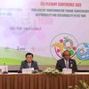 Bộ trưởng Bộ Nông nghiệp và Phát triển nông thôn Lê Minh Hoan và Trưởng Đại diện Tổ chức Lương thực và Nông nghiệp của Liên hợp quốc (FAO) tại Việt Nam Remi Nono Womdim đổng chủ trì hội nghị. (Ảnh: Vũ Sinh/TTXVN)