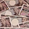 Đồng tiền mệnh giá 10.000 yen tại Tokyo (Nhật Bản). (Ảnh: AFP/TTXVN) 