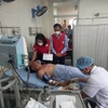 Các bệnh nhân trong vụ tai nạn thương tâm đang được tích cực điều trị tại bệnh viên Đa khoa Trung ương Quảng Nam. (Ảnh: Trịnh Bang Nhiệm/TTXVN)