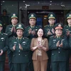 Quyền Chủ tịch nước Võ Thị Ánh Xuân với lãnh đạo, sỹ quan chỉ huy của Học viện Biên phòng. (Ảnh: Thống Nhất/TTXVN)