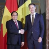 Thủ tướng Alexander De Croo đón và hội đàm với Thủ tướng Phạm Minh Chính thăm chính thức thức Vương quốc Bỉ (Brussels, 13/12/2022). (Ảnh: Dương Giang/TTXVN) 
