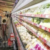Người dân mua sắm tại siêu thị Aeon Long Biên, Hà Nội. (Ảnh: Trần Việt/TTXVN) 