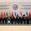 Các đại biểu chụp ảnh chung tại Hội nghị thượng đỉnh Tổ chức Hợp tác Thượng Hải (SCO) ở Samarkand, Uzbekistan ngày 16/9/2022. (Ảnh: AFP/TTXVN)